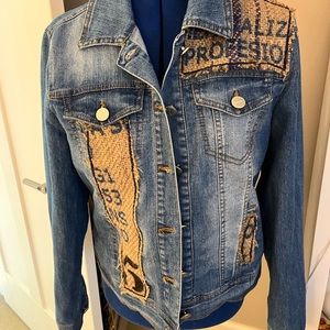 Women’s size large embellished jean jacket. Handmade